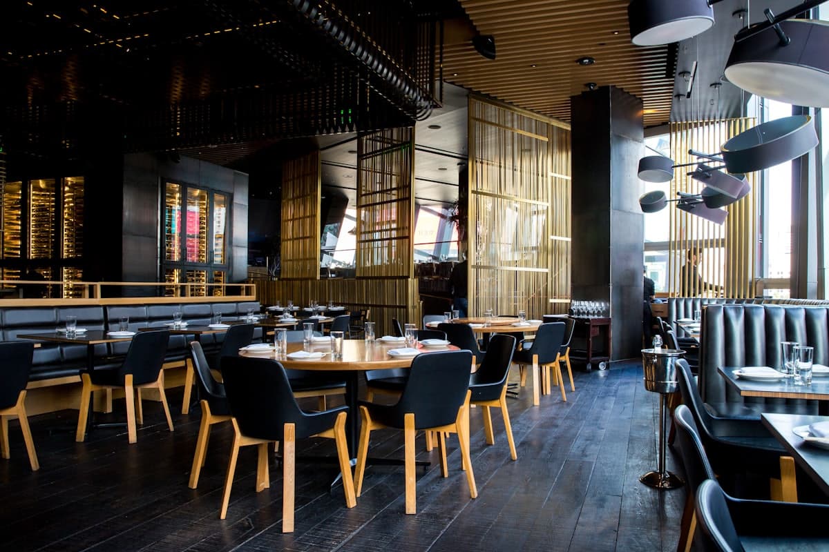 A warmly lit restaurant dining room